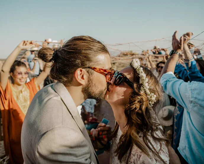 The newlyweds kiss as they leave their secular wedding ceremony in Toulouse